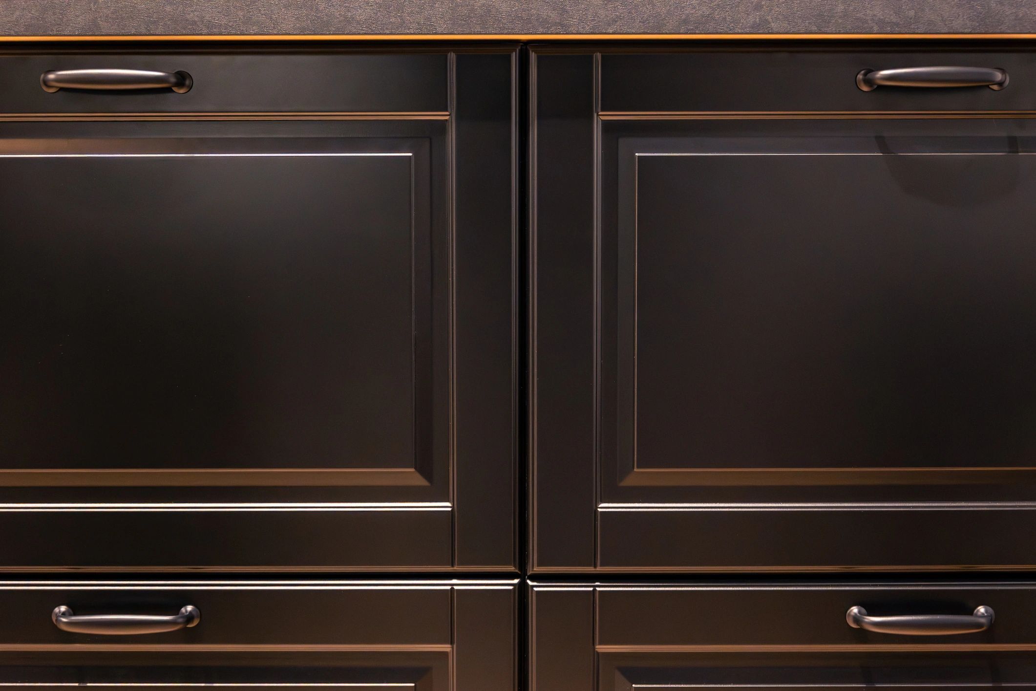 Premium dark cabinetry detail with refined finish